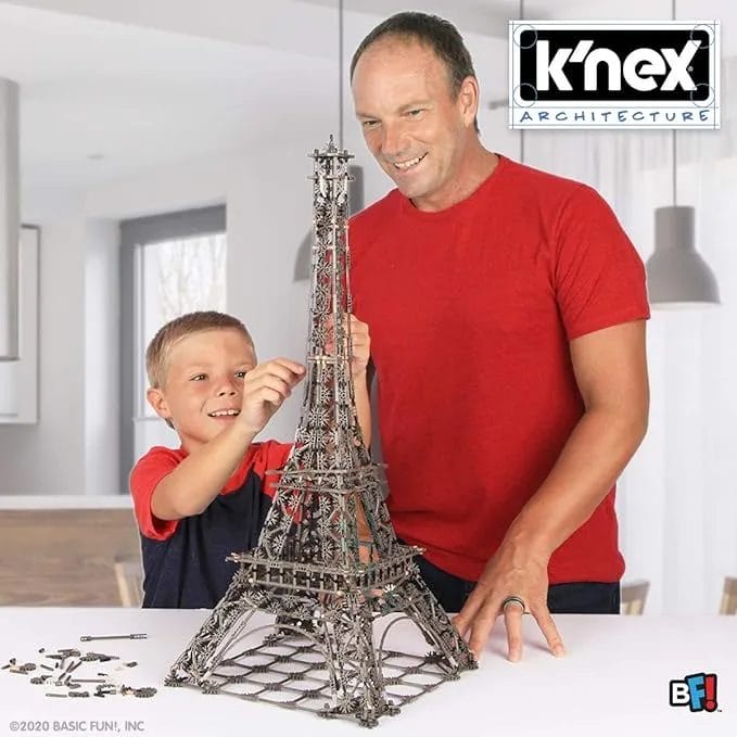 Child and father play with K'NEX Architecture Eiffel Tower