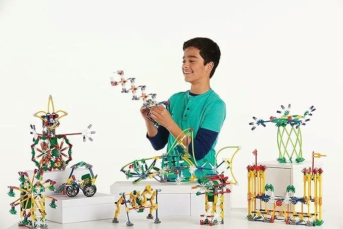 Child plays with K'NEX Imagine Power and Play Motorized Building set