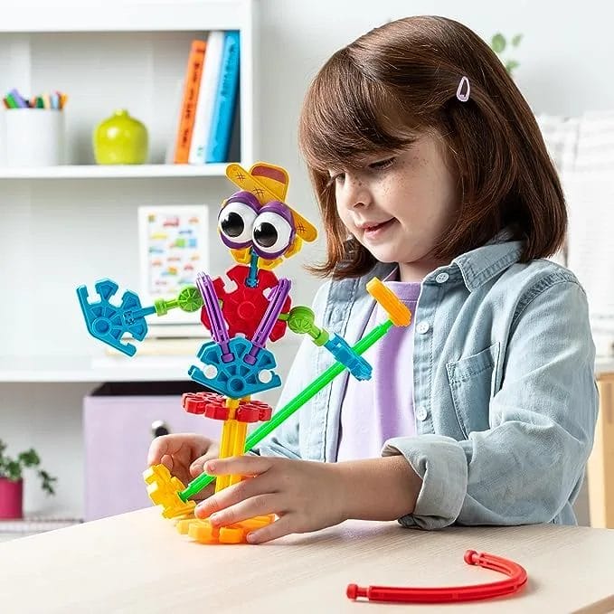 Child plays with Kid K'NEX Farmin' Friends Building Set