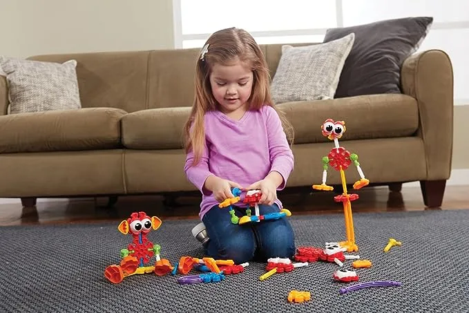 Child plays with Kid K'NEX Zoo Friends Building Set
